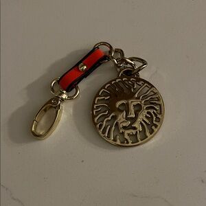Anne Klein Gold Keychain with Red and Black Strap